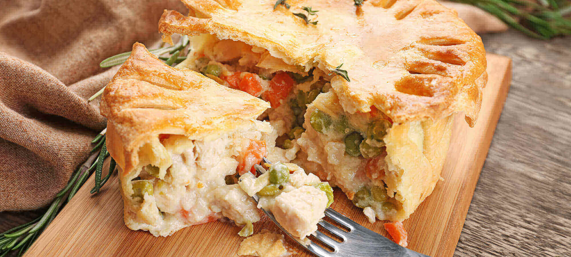 Tasty Baked Chicken Pot Pie On Wooden Board, Closeup